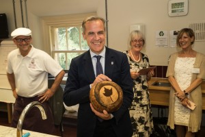 Mark Carney is delighted with his maple leaf loaf